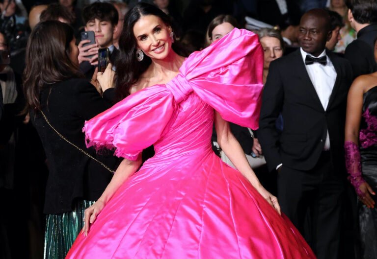 Demi Moore in Pink Silk Matieres Fecales at the “Paper Tiger” Premiere During the 79th Cannes Film Festival
